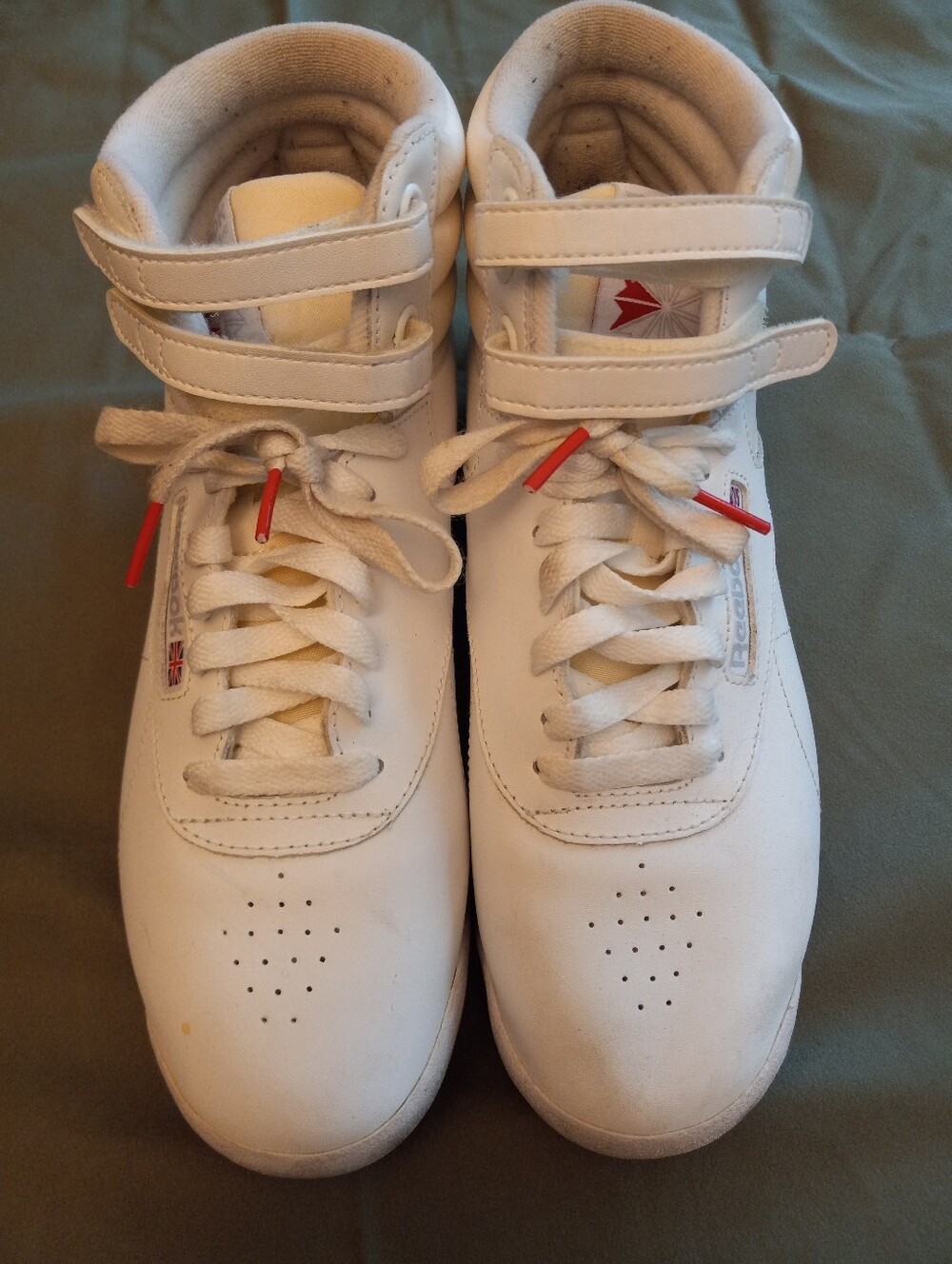 Reebok Freestyle White High-Top Sneakers with Red Accents